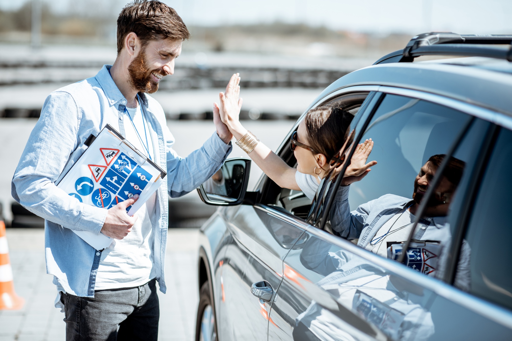 Instructor with driver on the training ground